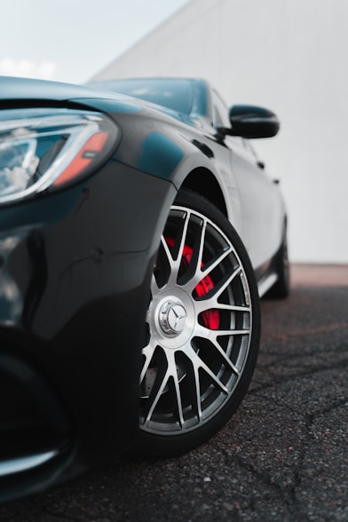black car with chrome wheel