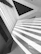 A high-contrast shot of a luxury renovation site showcasing sharp architectural lines and refined finishes.