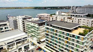 A panoramic view of a high-rise residential complex overlooking Lake Michigan.