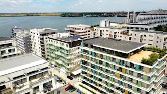 A panoramic view of a high-rise residential complex overlooking Lake Michigan.