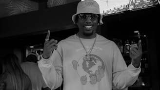 Close-up of a smiling customer enjoying the sports entertainment experience provided by Octo Sports.