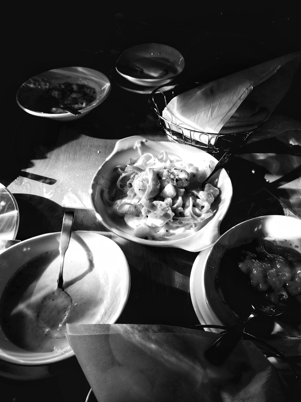 grayscale photo of soup in bowl