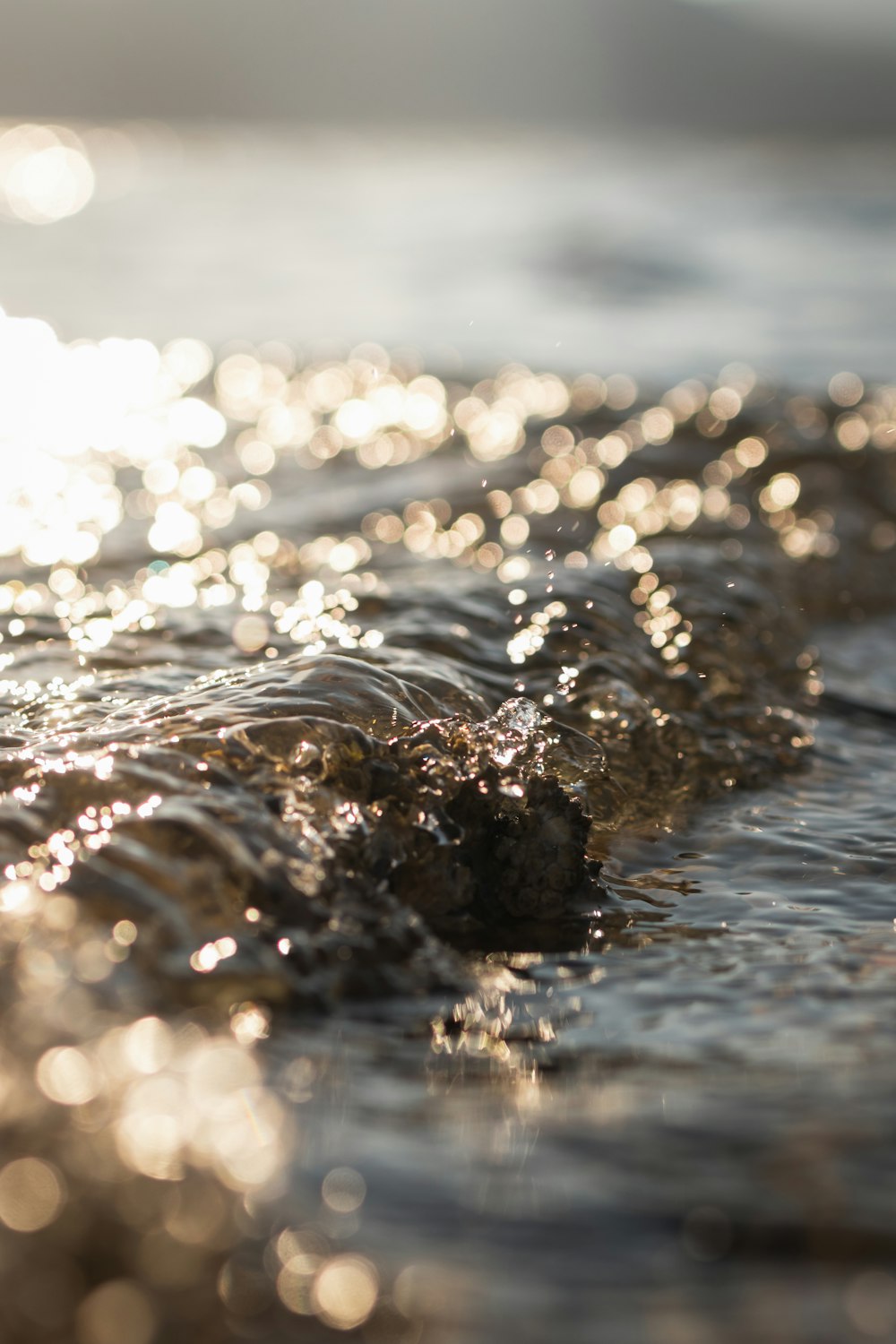 water splash on brown rock