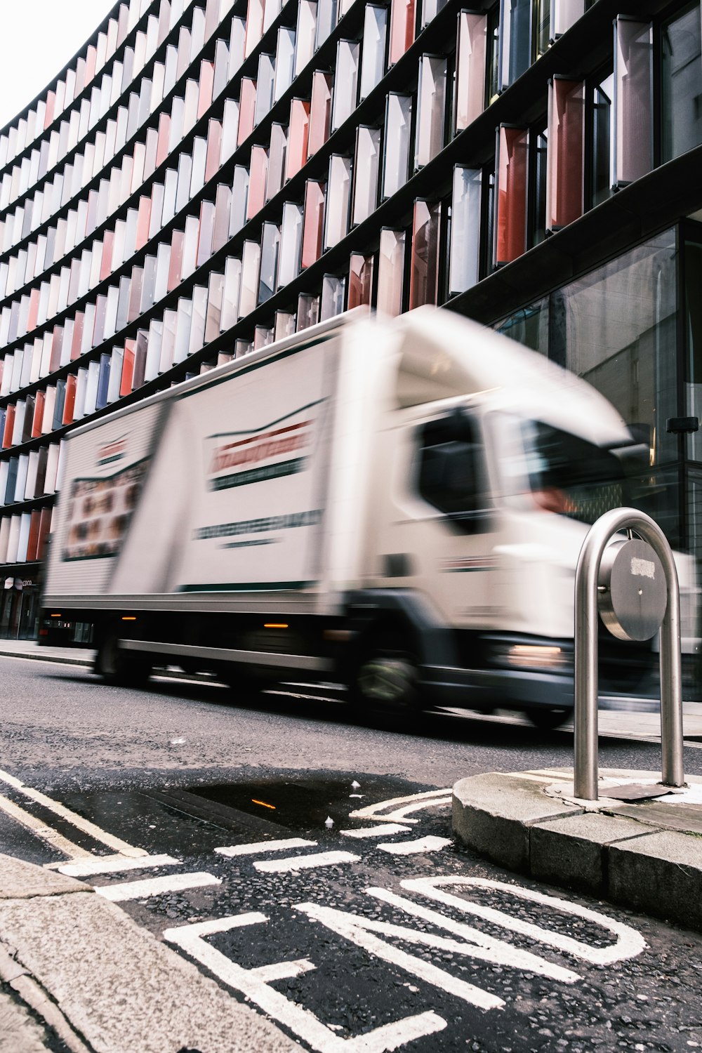 white and brown truck on road during daytime