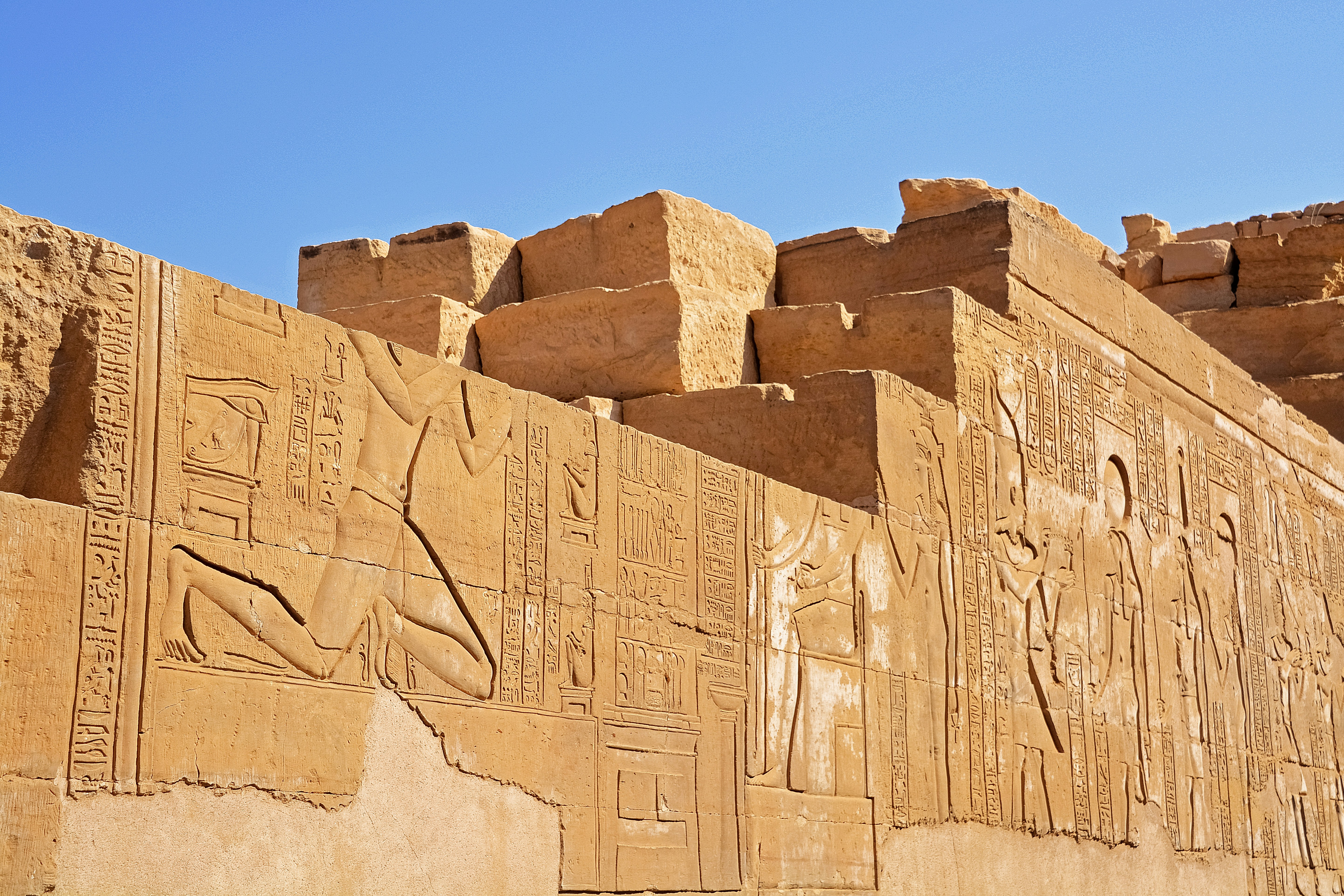 brown concrete building under blue sky during daytime
