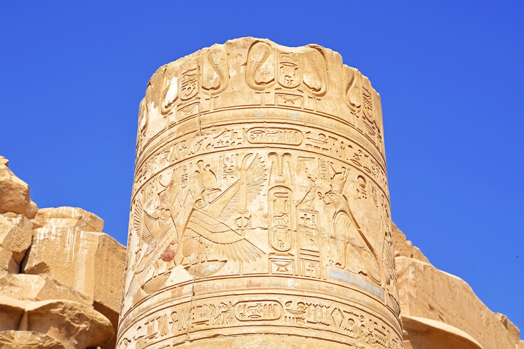 brown concrete tower under blue sky during daytime