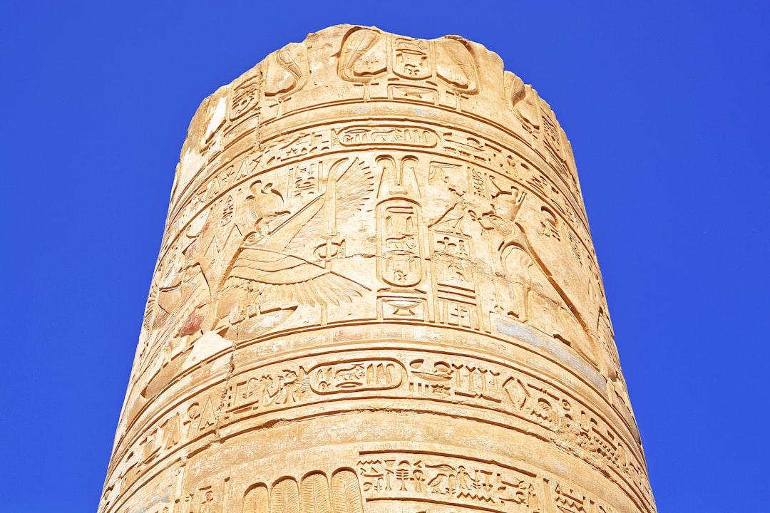 brown concrete tower under blue sky during daytime