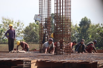 people standing on brown wooden bridge during daytime