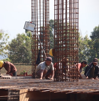 people standing on brown wooden bridge during daytime