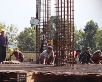 people standing on brown wooden bridge during daytime