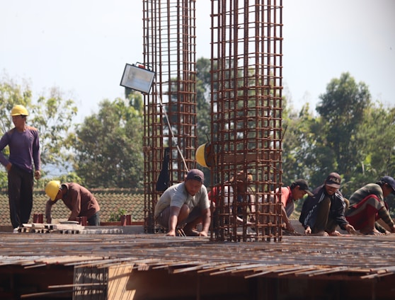 people standing on brown wooden bridge during daytime