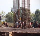 people standing on brown wooden bridge during daytime