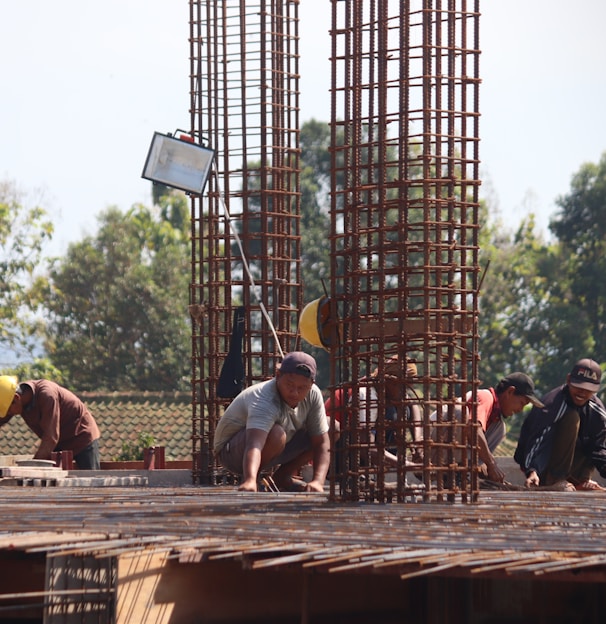 people standing on brown wooden bridge during daytime