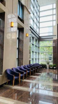 Bright, clean commercial lobby with polished floors and seating.