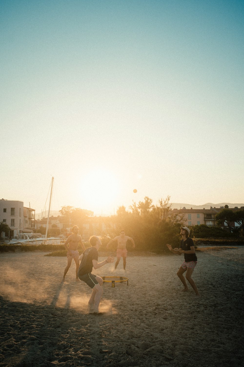 people playing basketball during daytime