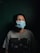 man in gray crew neck shirt with white face mask