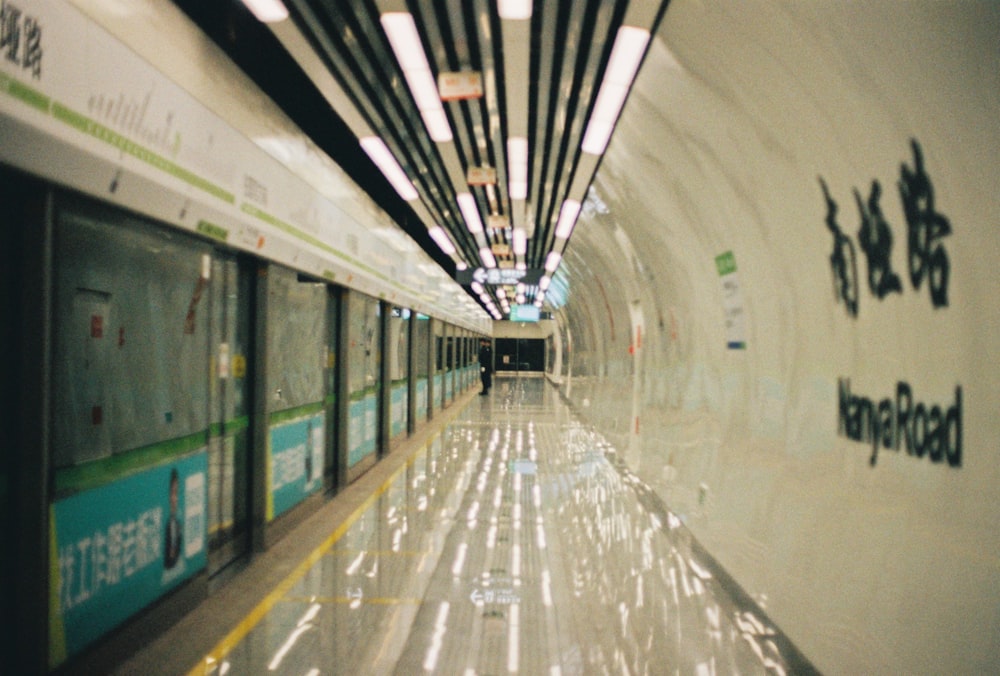 white and black tunnel with lights