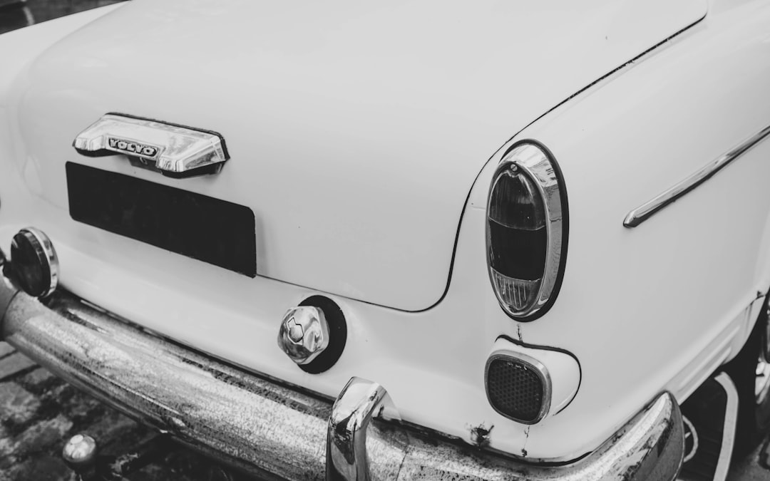 grayscale photo of car door