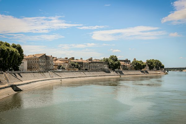 The Rhône and the town along its bank — Arles, France