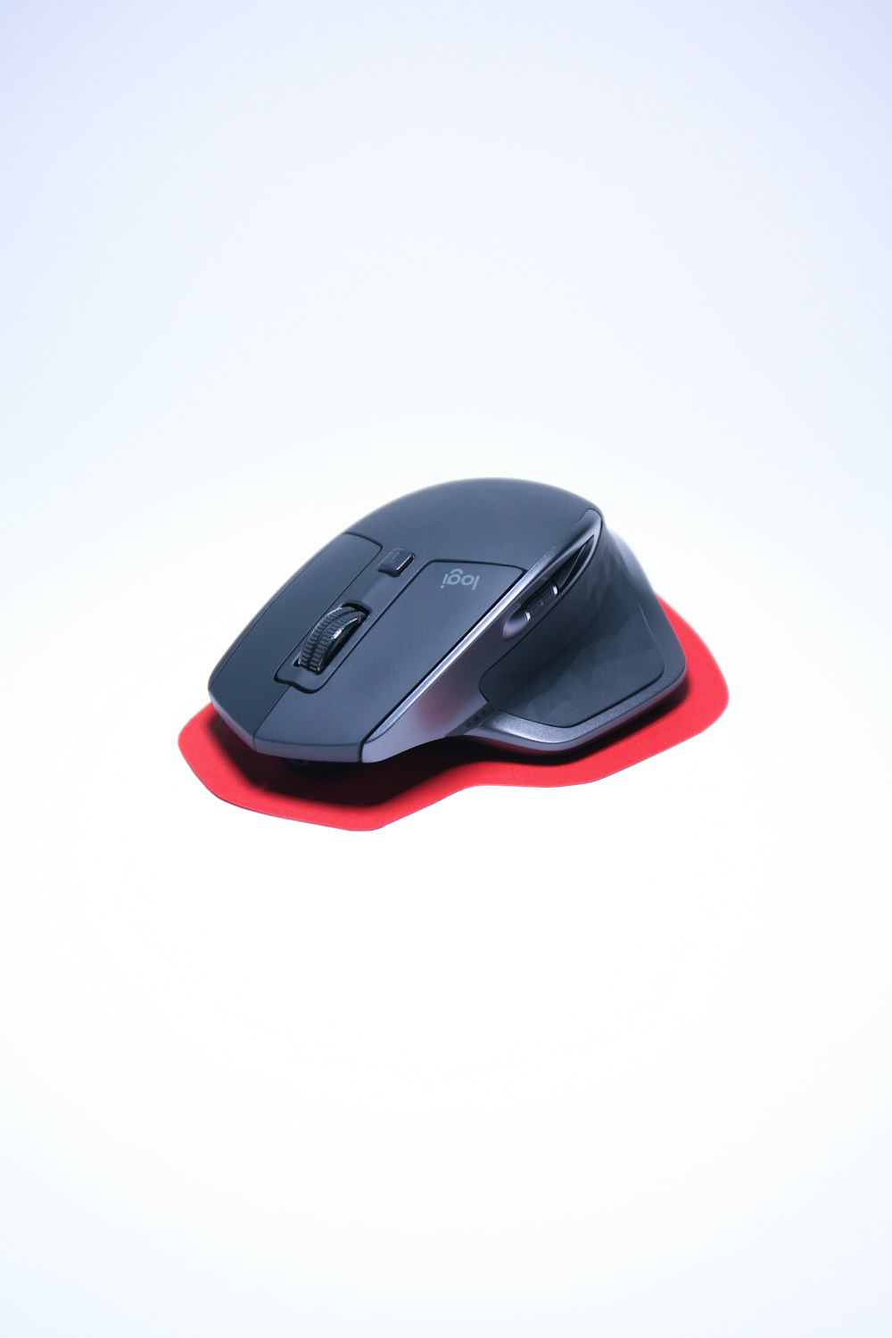 black and red cordless computer mouse