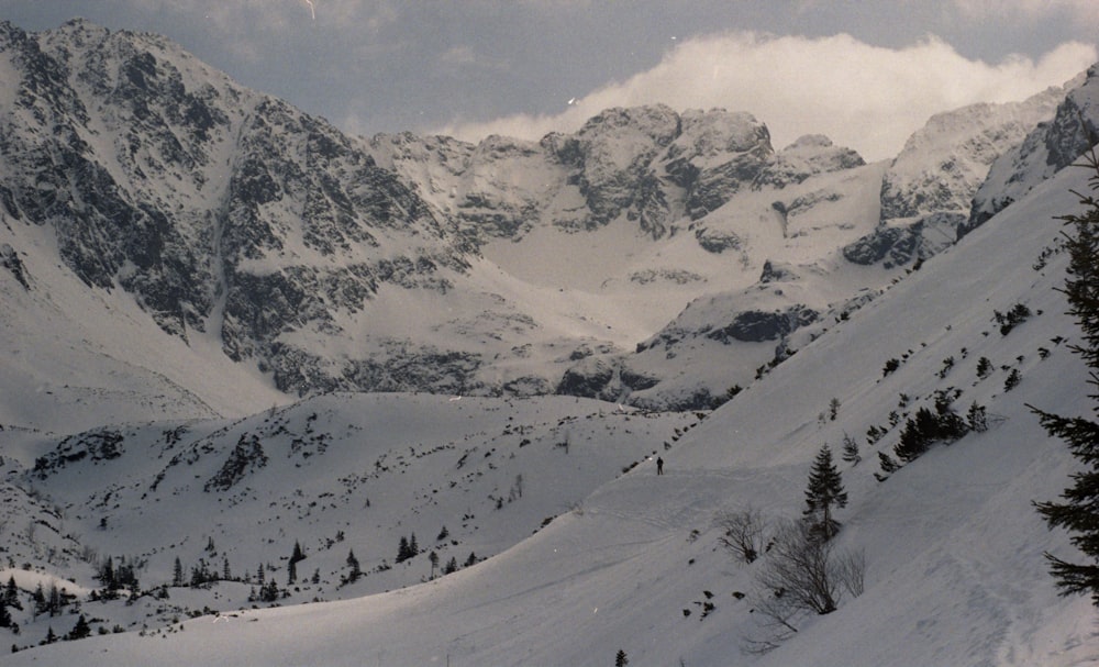 snow covered mountain during daytime