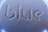 The image displays a close-up view of a surface with the word 'blue' embossed in a modern, geometric font style. The texture appears smooth with a play of light and shadow enhancing the three-dimensional effect of the lettering.