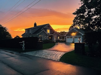silhouette of houses during sunset