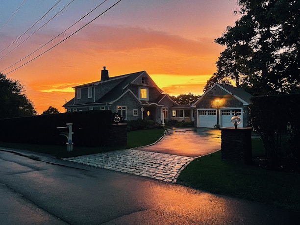 silhouette of houses during sunset