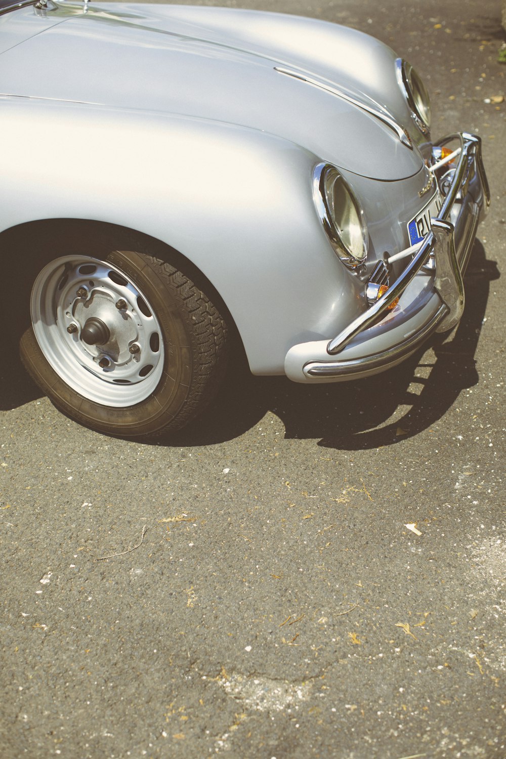 white car with chrome wheel