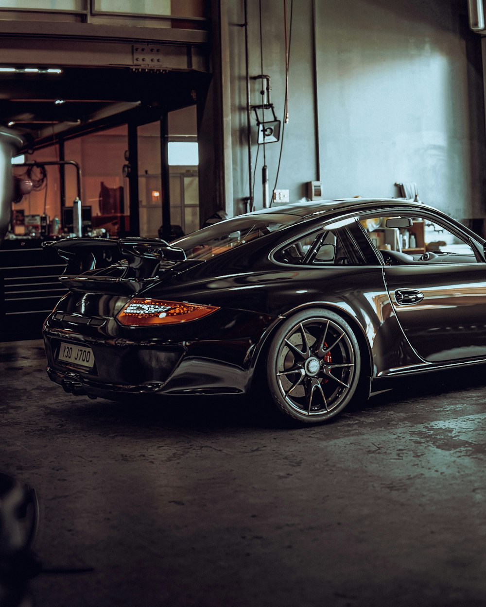 black bmw m 3 coupe parked in garage