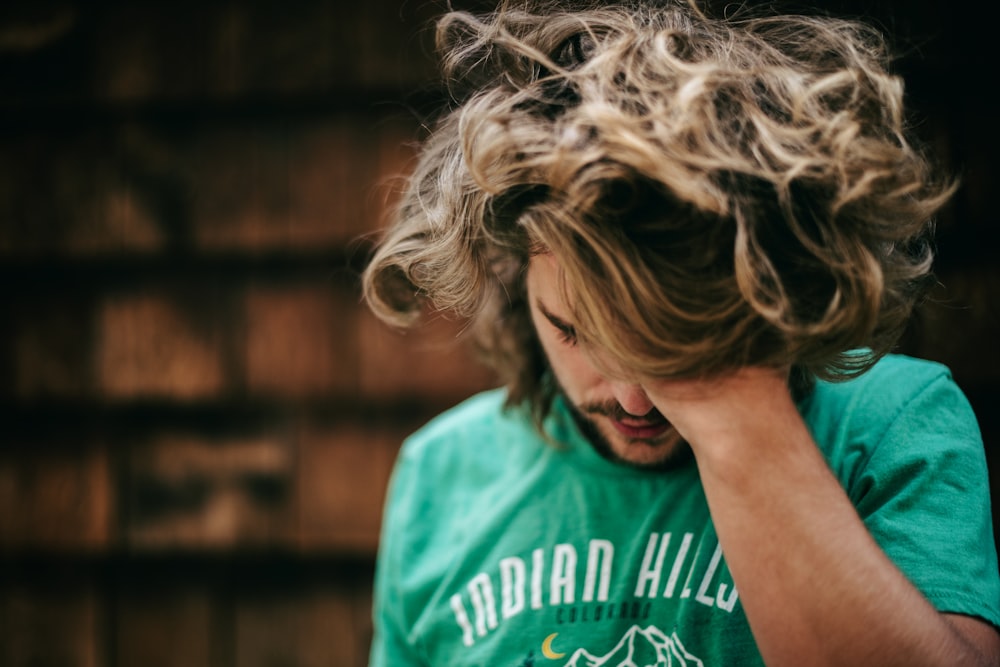 woman in green crew neck t-shirt