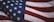 us a flag on white and red striped textile