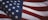 us a flag on white and red striped textile