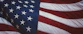 us a flag on white and red striped textile