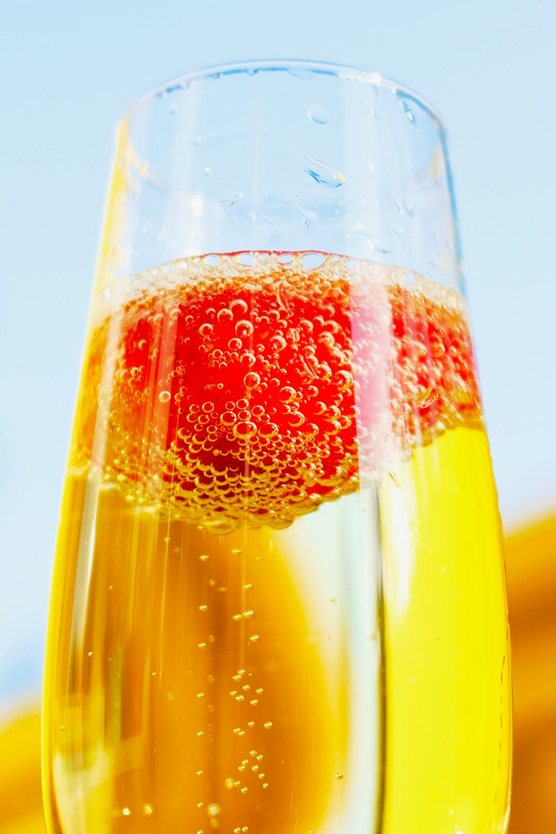 clear drinking glass with red liquid