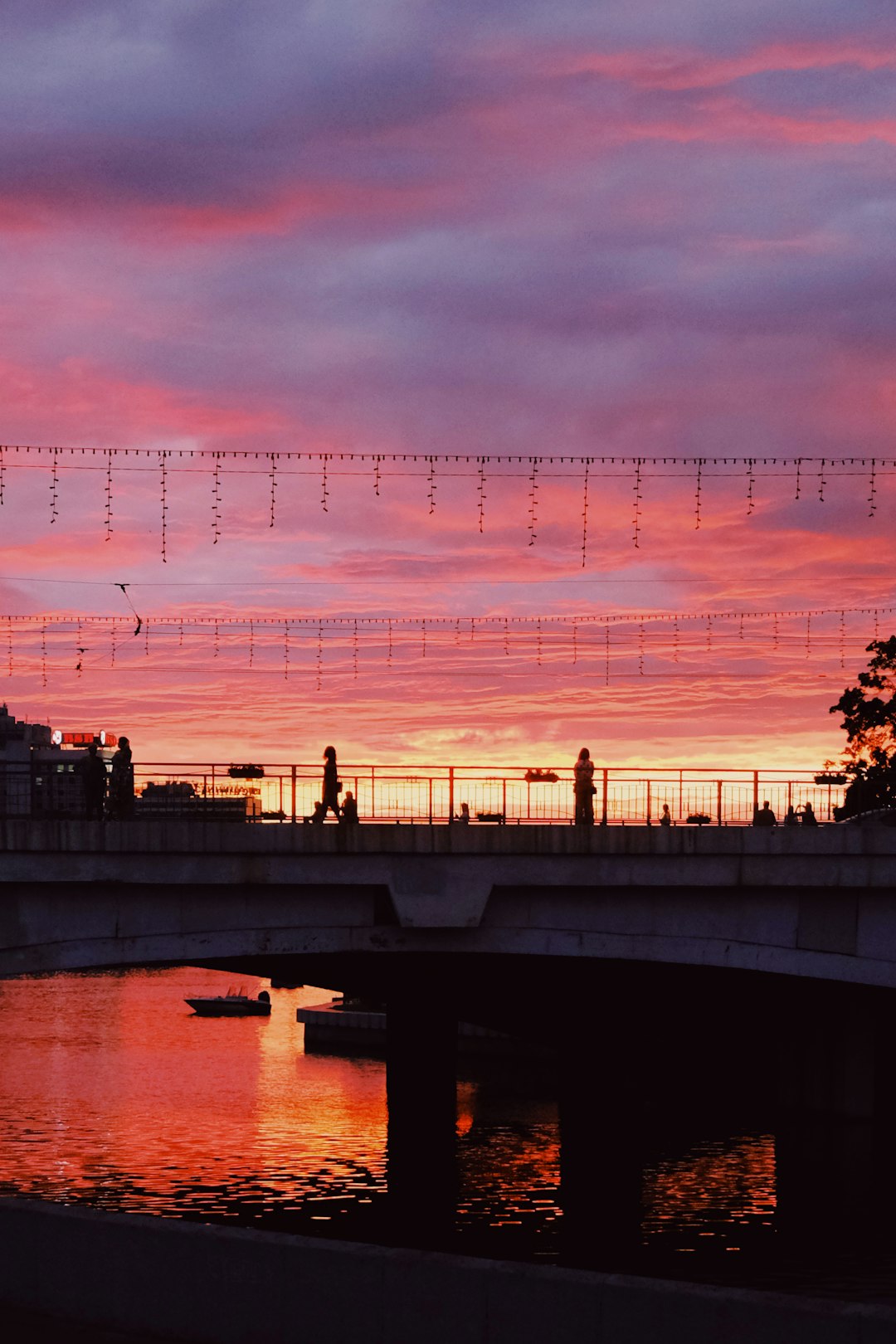 people walking on bridge during daytime