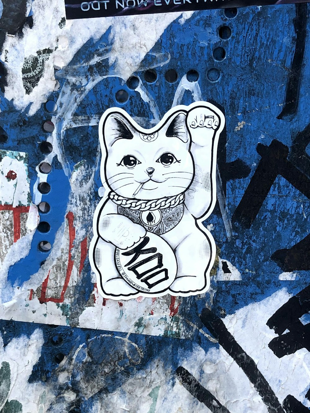 white and blue cat painting