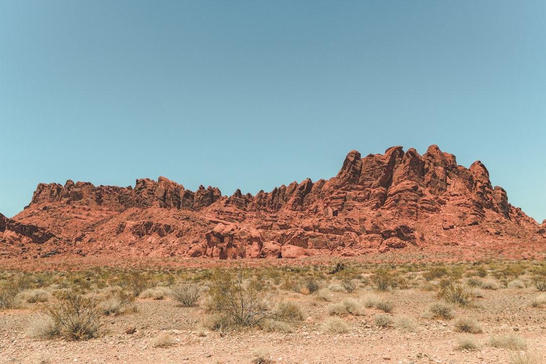 brown rock formation under blue sky during daytime