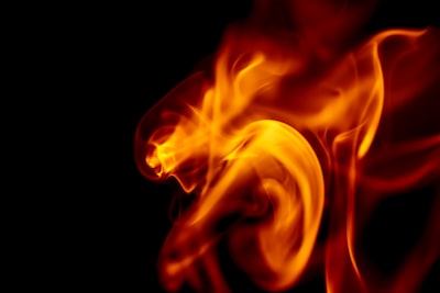 orange and yellow fire illustration explosive zoom background