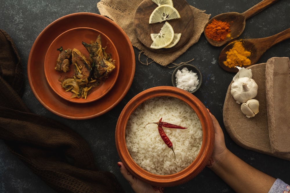 red chili on brown round plate