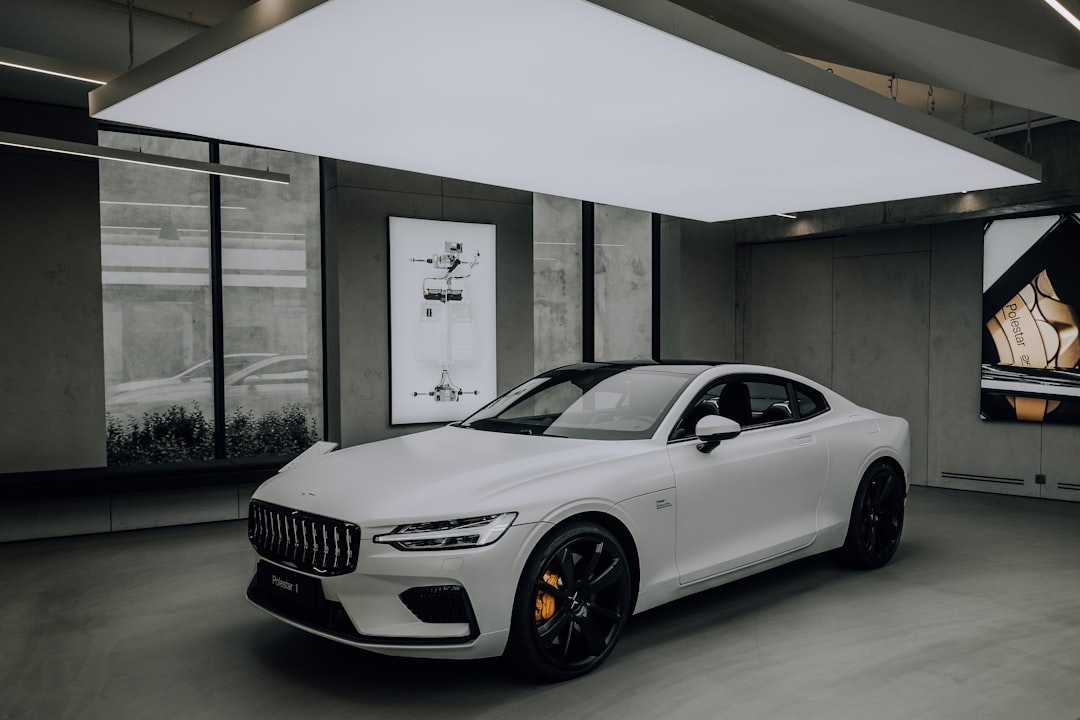 white bmw m 3 coupe parked in front of white building, Polestar 1 - Volvo