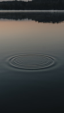 water drops on body of water