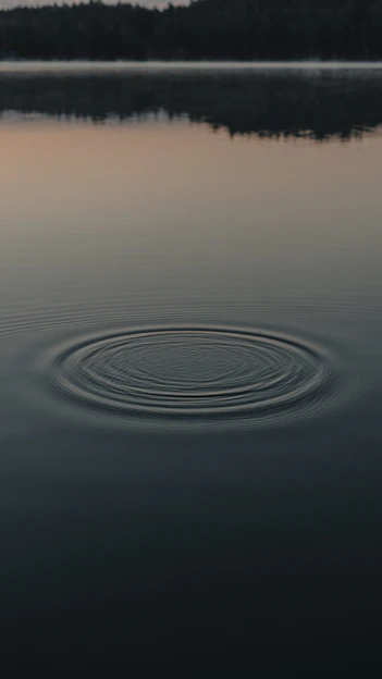 water drops on body of water