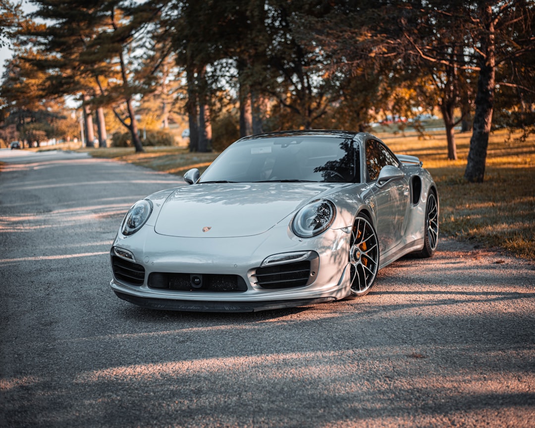 silver porsche 911 on road during daytime