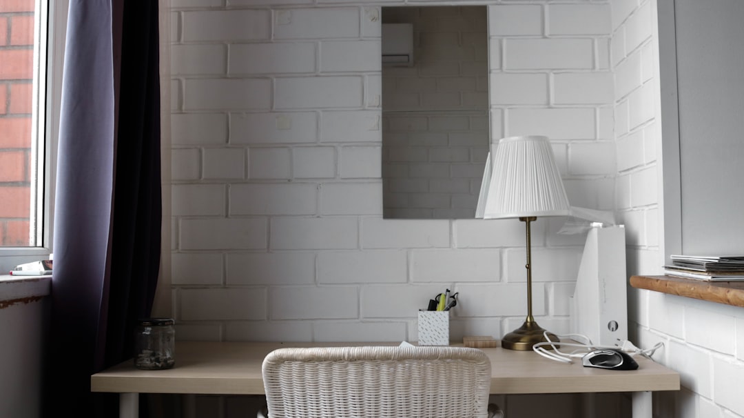 white table lamp on brown wooden table