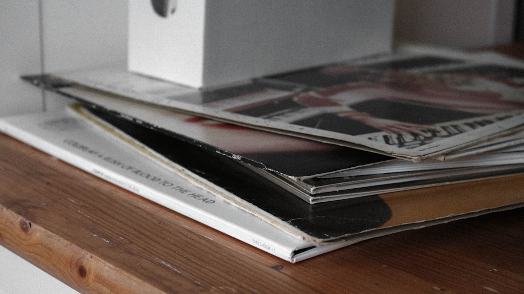 white printer paper on brown wooden table