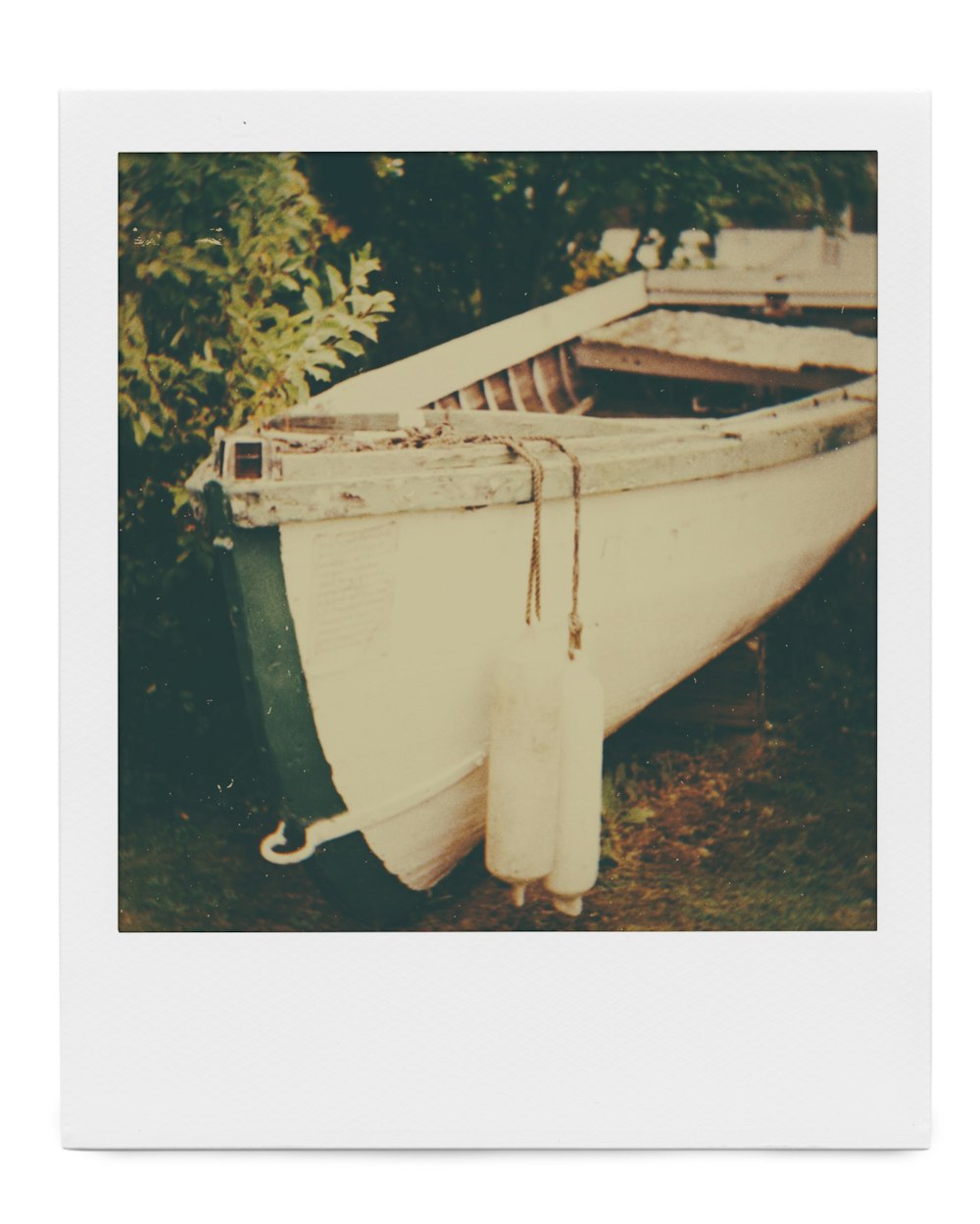 white and blue boat on water during daytime