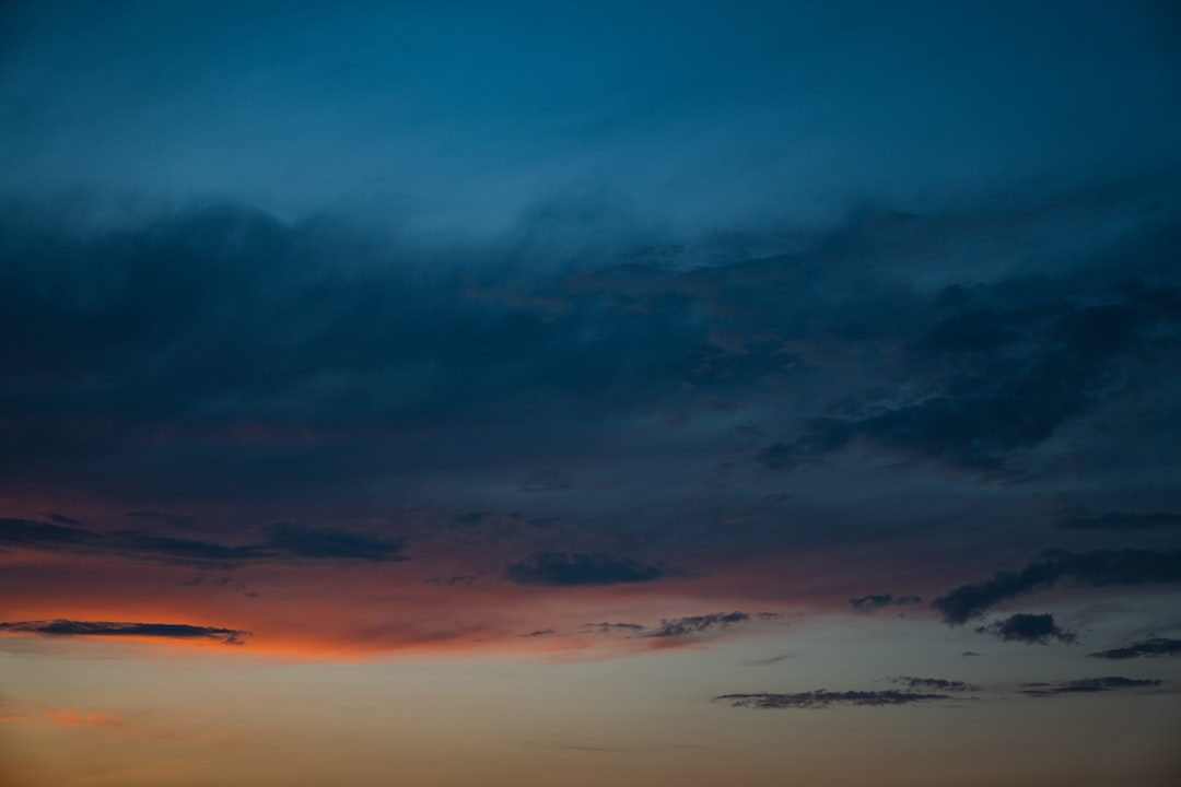 blue and orange cloudy sky during sunset