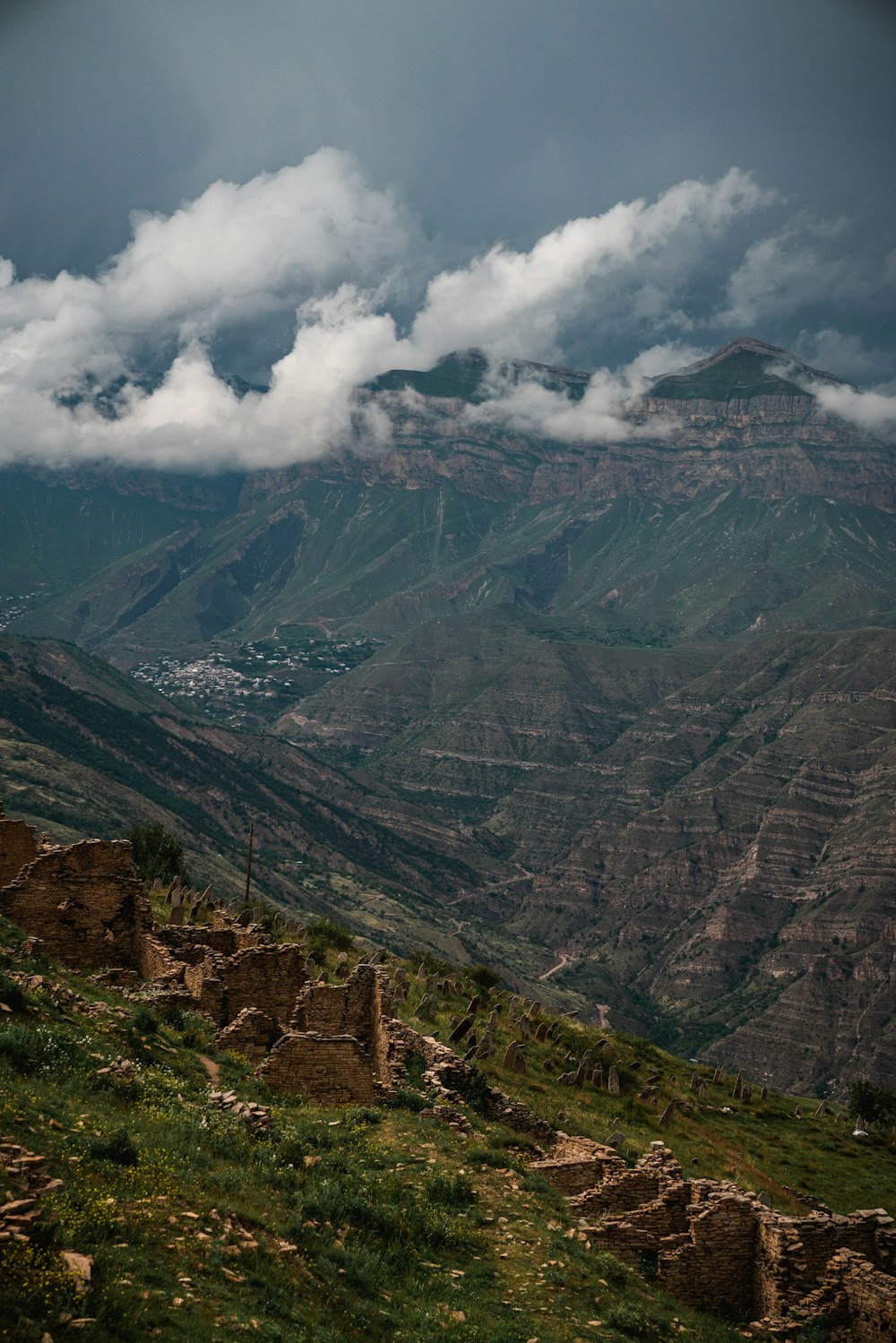 green and brown mountains under white clouds during daytime