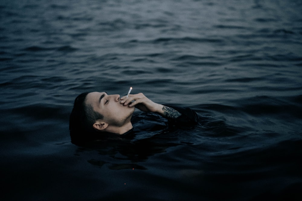 woman in water during daytime